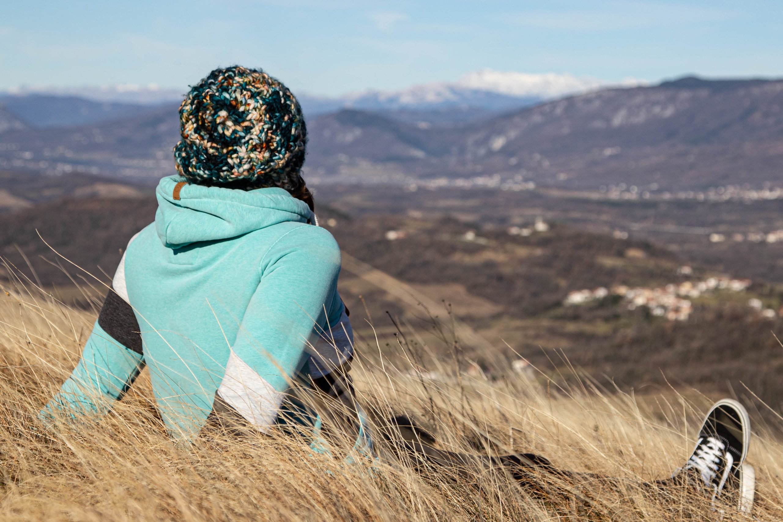 girl wearing a hand kintted baggy beanie